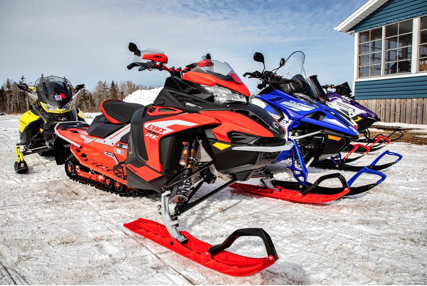 Snowmobilers riding groomed trails across Prince Edward Island — PEISA trail network